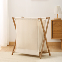 Panier à linge en bois et tissu pliable